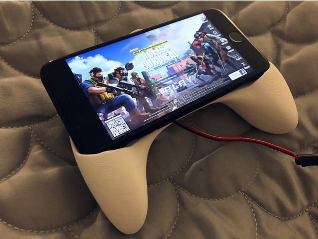 A cell phone on a device
Description automatically generated